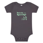 Dark grey baby onesie with "Born to Rock & Roll" in mint color with a baby stroller rolling away.