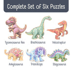 A set of six dinosaur wooden puzzles shown as illustrated pieces with names below each one: Tyrannosaurus Rex, Brachiosaurus, Velociraptor, Ankylosaurus, Triceratops, and Stegosaurus. The top banner reads 'Complete Set of Six Puzzles' on a white background.