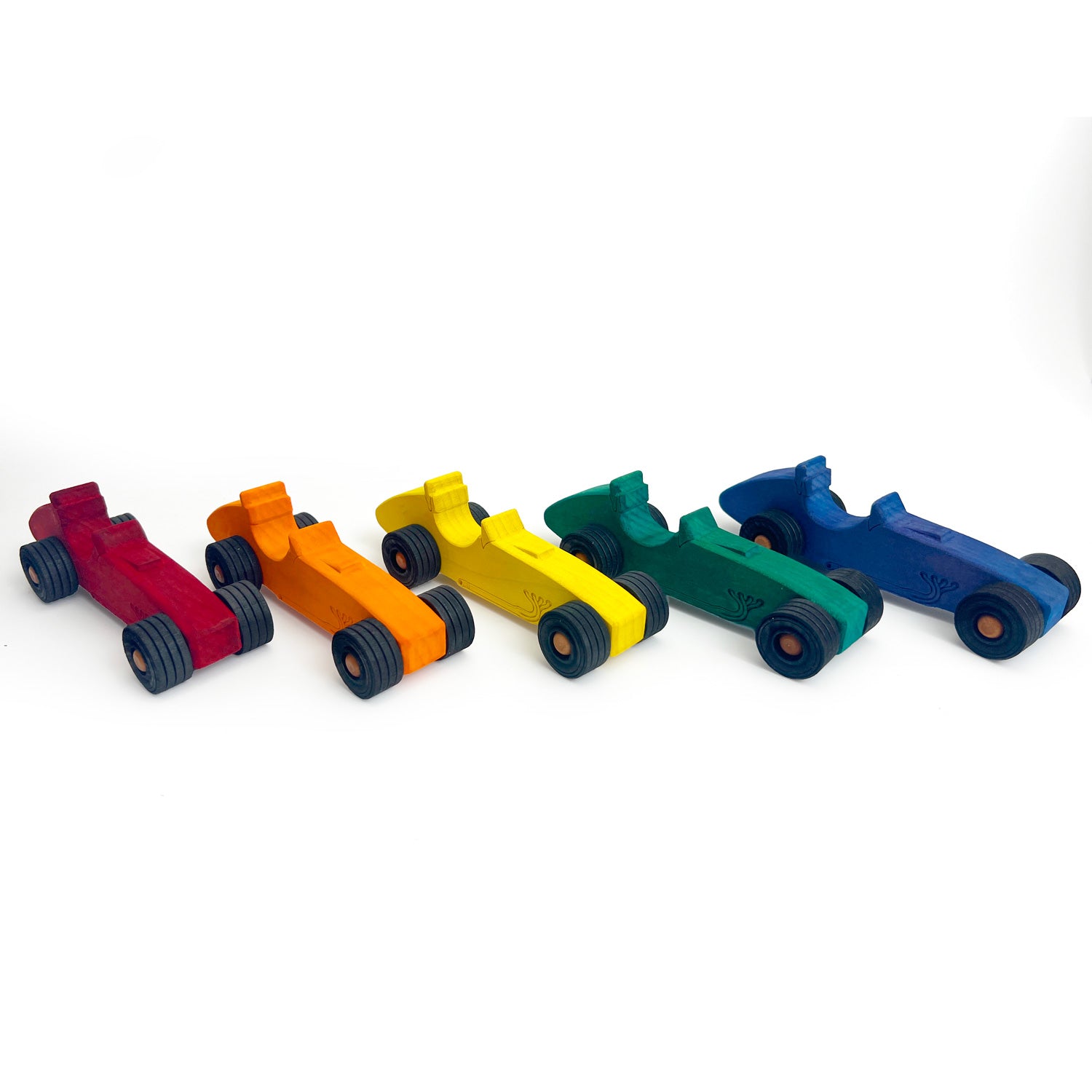 Five colorful toy race cars on a white background