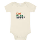Natural color baby onesie with "Eat, Play, Sleep" on it in orange, green and navy.
