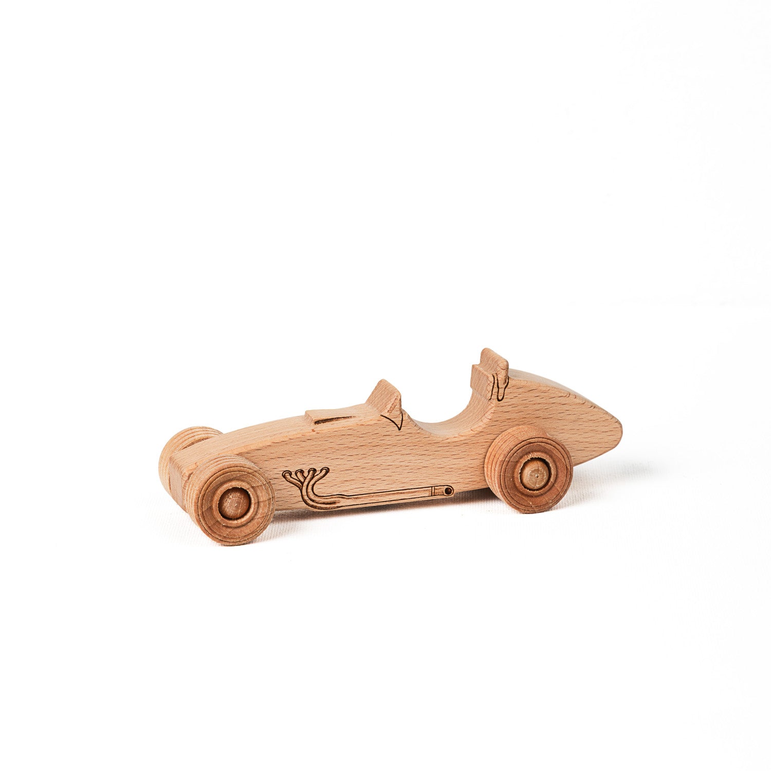 A small handcrafted wooden toy race car with visible wood grain and detailing.