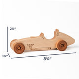 A small wooden toy race car shown on a white background with dimension lines and labels indicating its height of 2 3/4 inches, width of 8 3/4 inches, and depth of 1 3/4 inches.