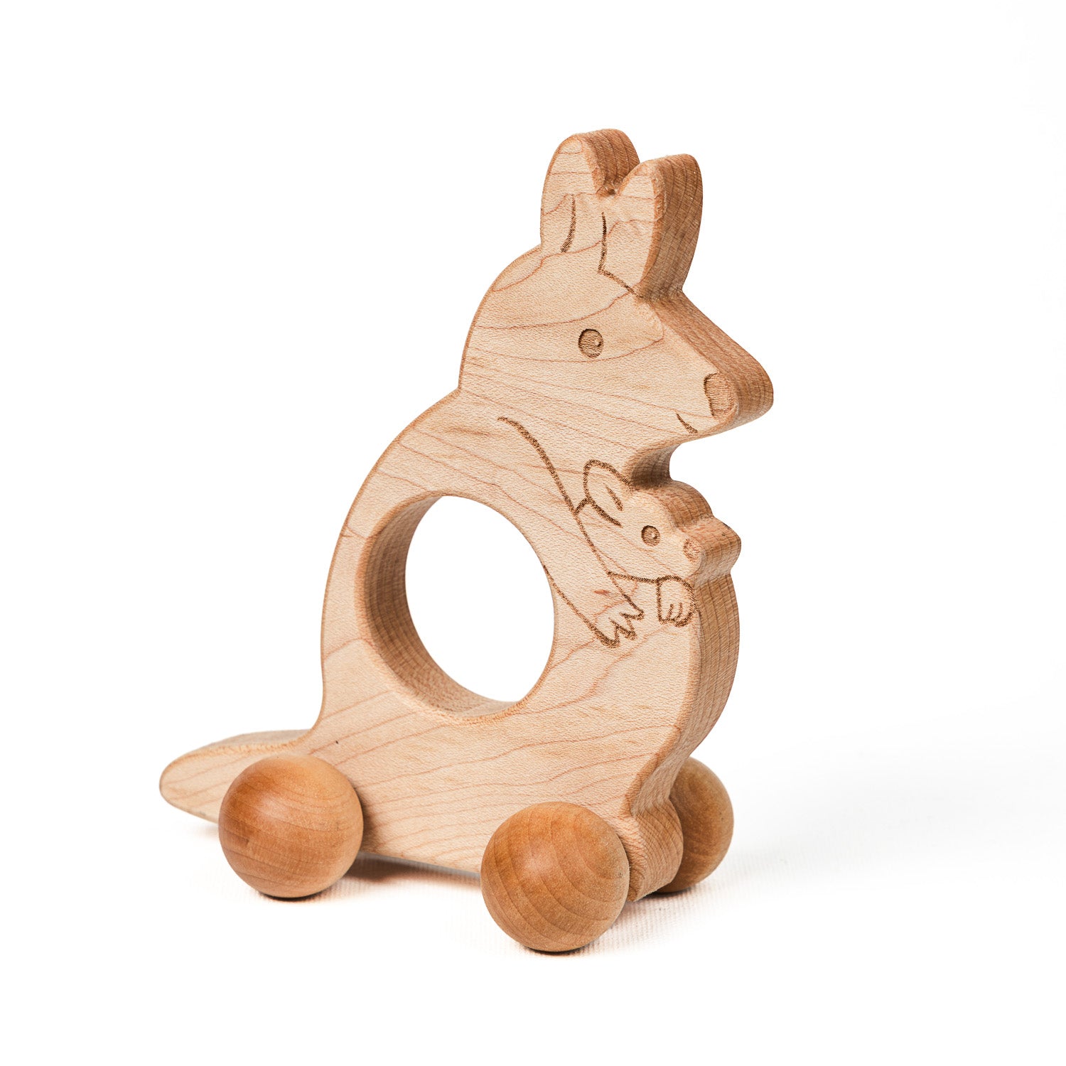 A wooden kangaroo push toy with large textured sphere wheels, designed for babies and toddlers.