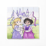 A completed wooden magnetic puzzle depicting two princess figures and a castle, with pieces arranged in a 4x4 grid.
