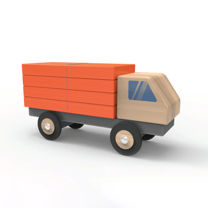 Stacked 3D wooden truck. This Montessori-inspired 3D stacking truck with shape cut outs helps kids fine motor skills. 