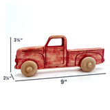 Red distressed wooden truck 9"Long by 2.25" Wide by 3.75" High