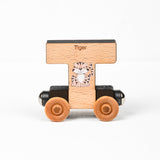 Wooden toy car shaped like the letter 'T' with a tiger design on a white background