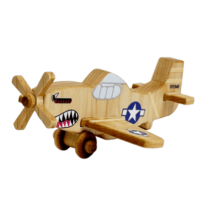 Front view of wooden toy plane with US military insignia and shark teeth nose art found on World War 2 planes. These wooden planes are durable, eco-friendly, and inspired by Montessori learning.