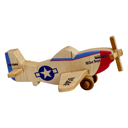 Wooden toy plane with US military insignia and nose art of a type of World War 2 planes. These wooden planes are durable, eco-friendly, and inspired by Montessori learning.